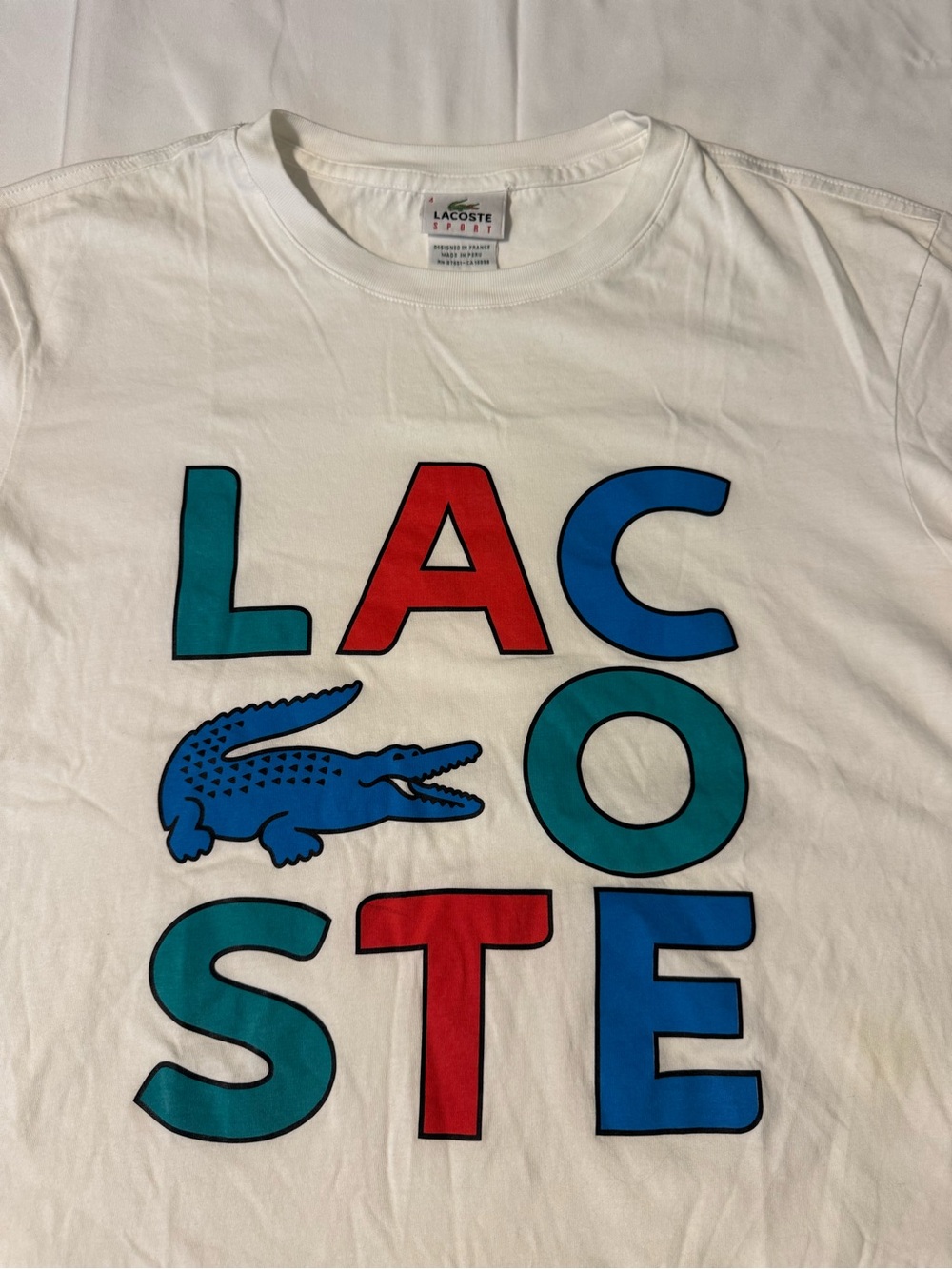 Lacoste White Short-Sleeve Tee with Red, Blue and Teal Logo size 4 (medium)